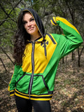 Model showcasing the Southern Sugah Zip-up Hoodie in vibrant green and yellow, exuding strength and retro vibes in nature.