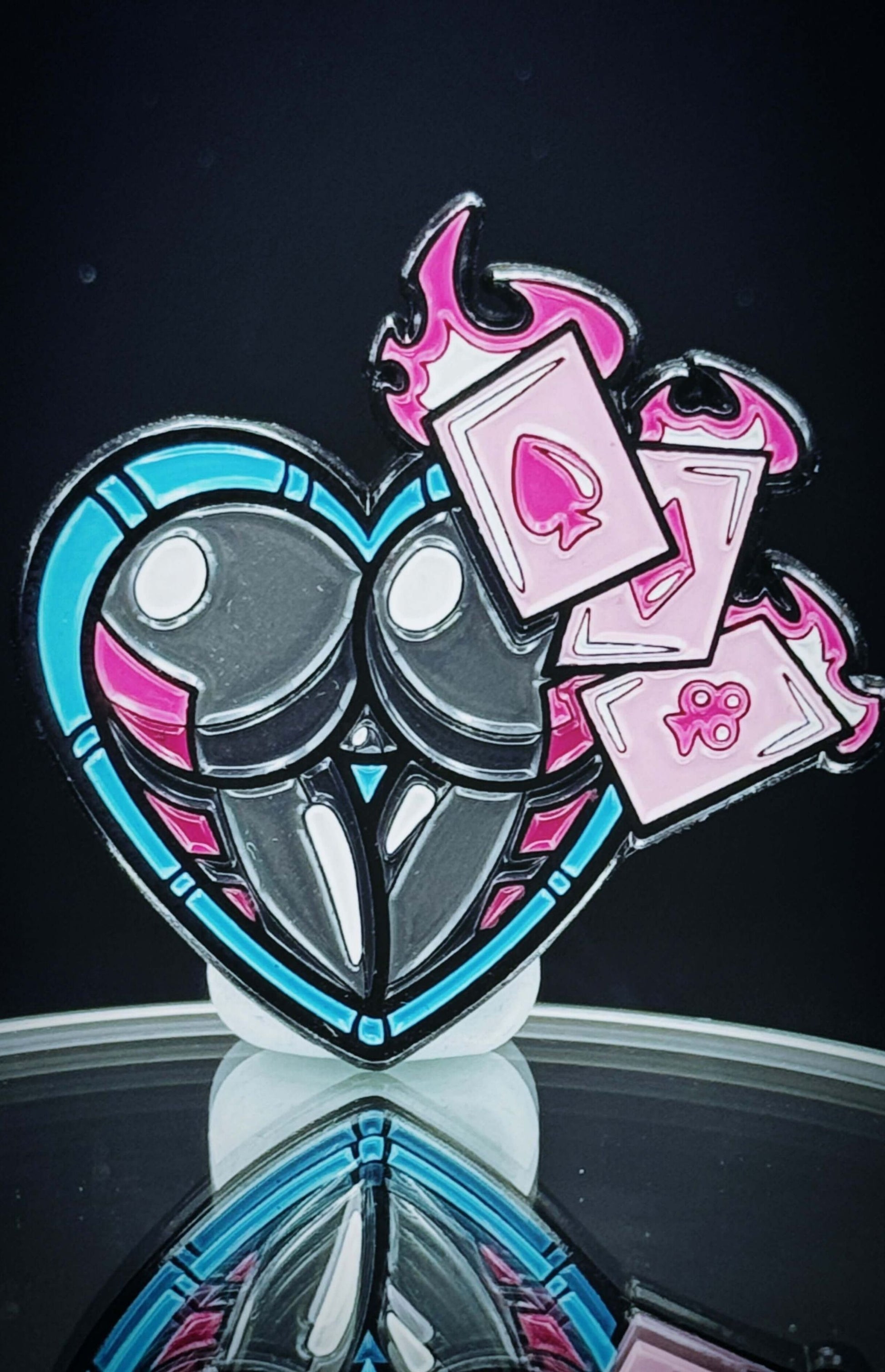 Kinetic Gambler Ass-Tonishing Pin featuring playful design with hearts and cards, perfect for collectors and humor lovers.