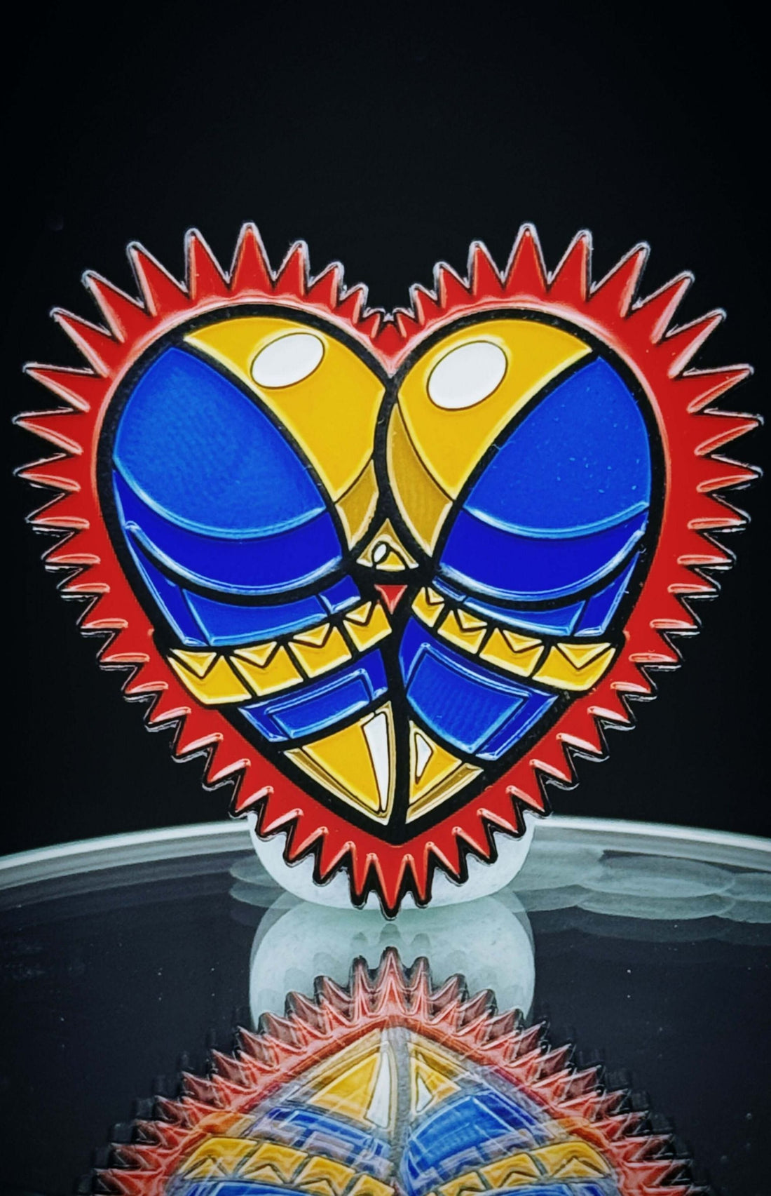 One-Eye Ass-Tonishing Pin featuring a colorful heart design, perfect for humor and style in team uniforms.