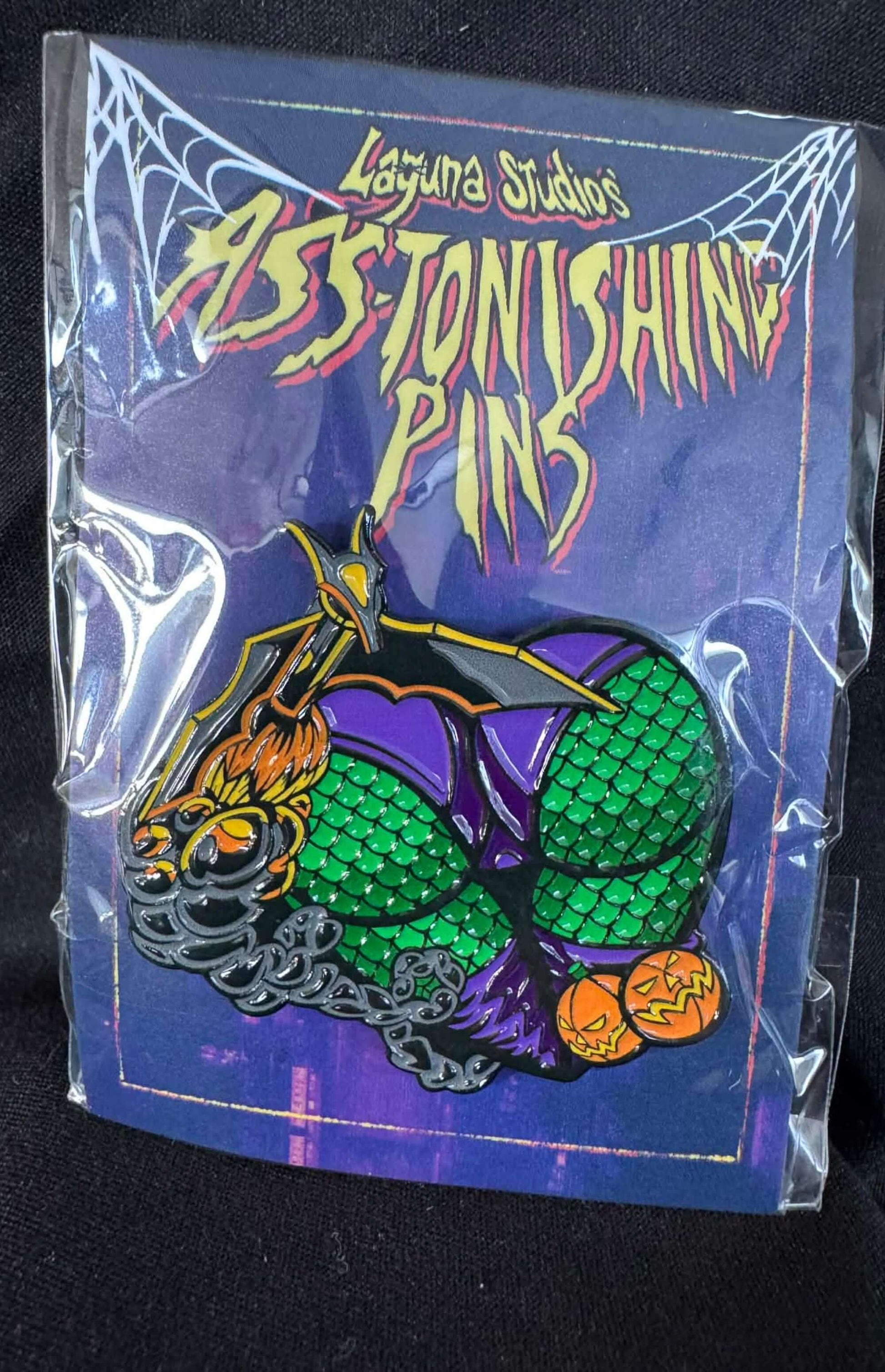 Gobblin ASS-tonishing Pin featuring a comic character with vibrant colors and playful design from Laguna Studios.