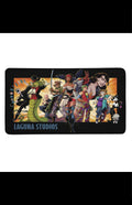 Laguna Studios Desk Mat featuring iconic studio artwork and characters, perfect for gamers and artists.