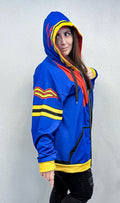 A model wearing the Rook Zip-up Hoodie featuring vibrant colors and a stylish design.